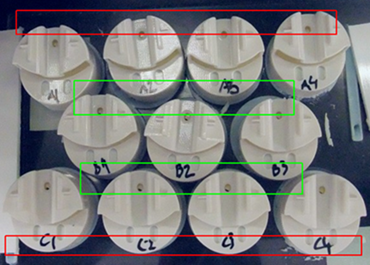 Parts aligned 1mm from each other on a 3D printed tray