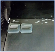 Dripped material on a 3D printer build tray Dripped material on a 3D printer build tray