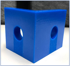 3D printed blue part with holes