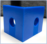 3D printed blue part with holes 3D printed blue part with holes